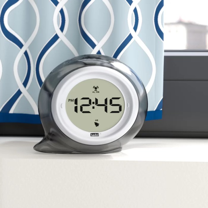 Alarm clock that squirts water